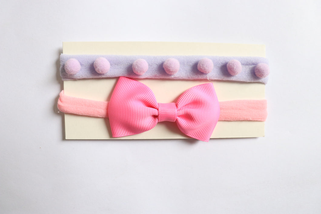 FAIXA POMPOM LILÁS E GRAVATINHA ROSA